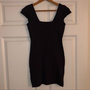 Purple bebe mini dress with chevron stitching.